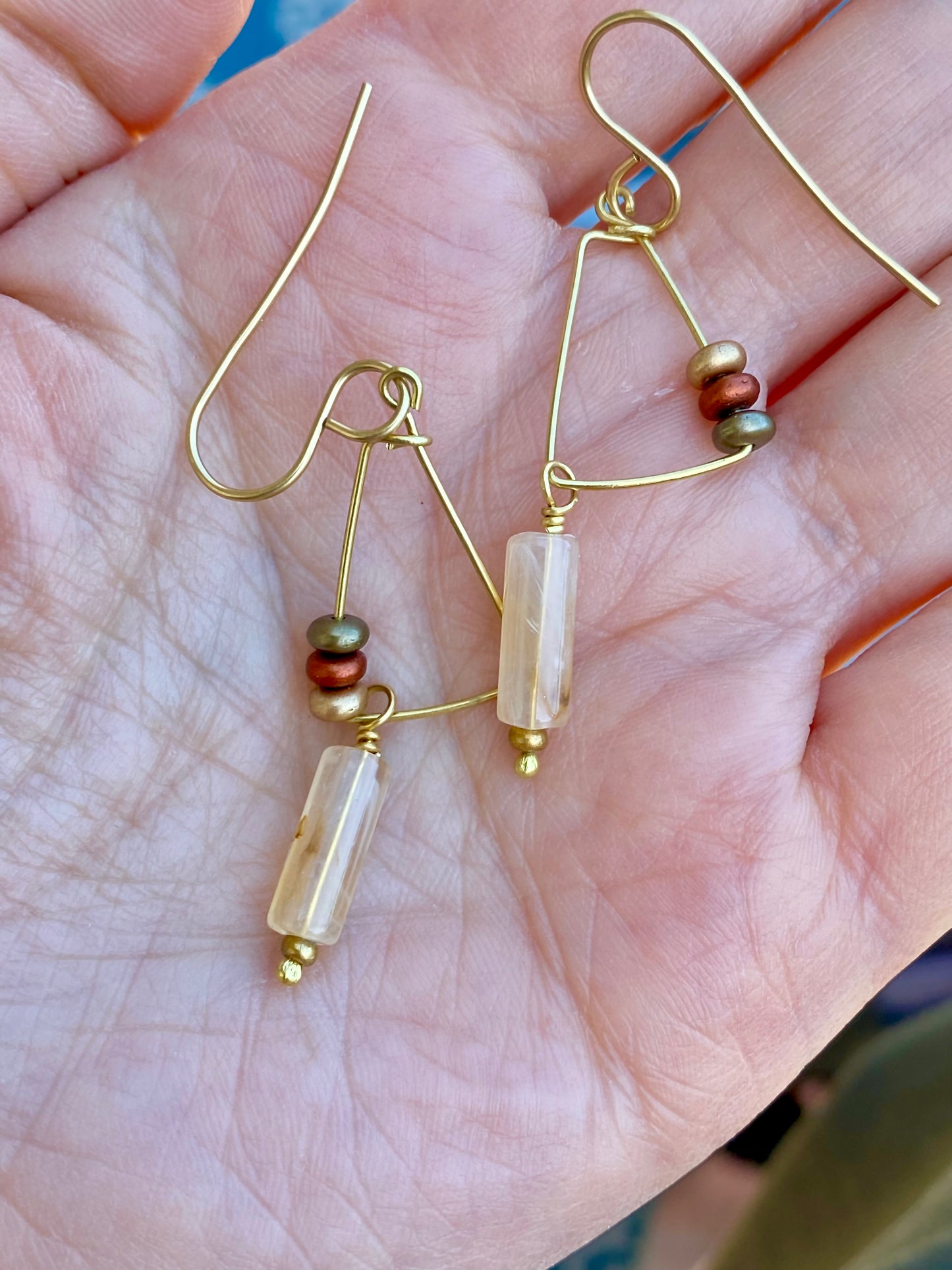 Earrings: Brass Dangles with harlequin quartz and glass bead accent