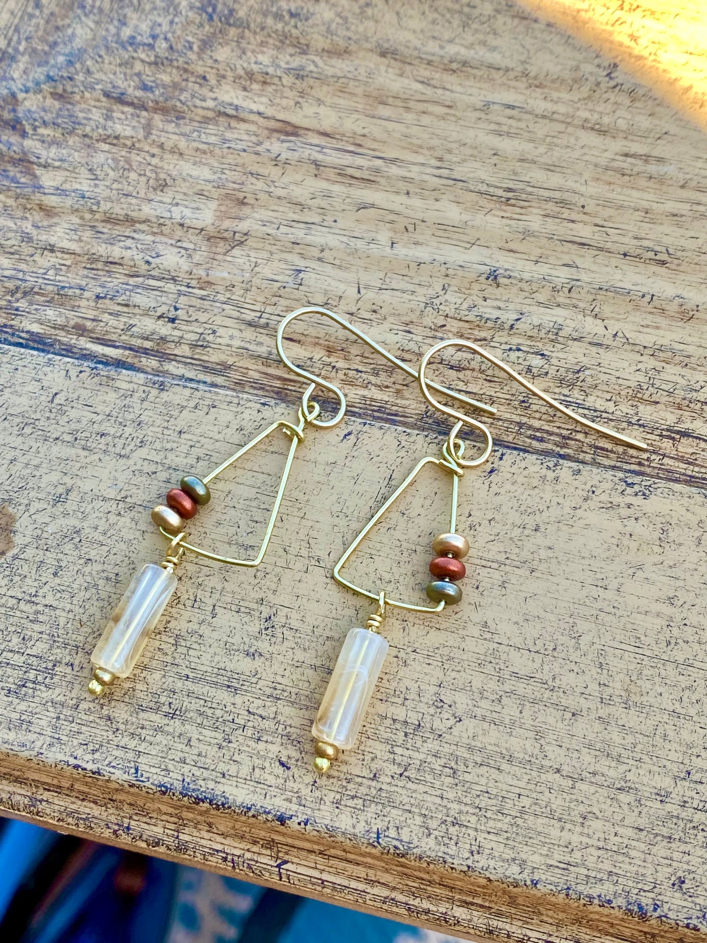 Earrings: Brass Dangles with harlequin quartz and glass bead accent